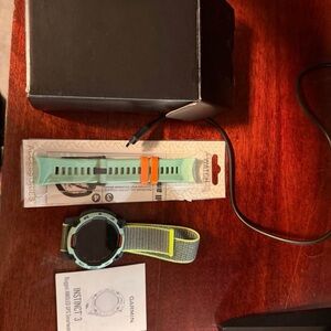 Garmin Instinct 3 Smartwatch - Black and Green with Orange Accent